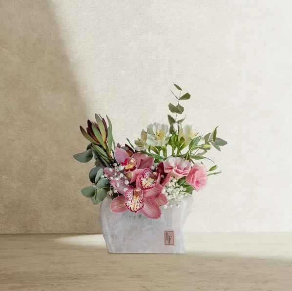 Reem β Grace in a Natural Stone Vase